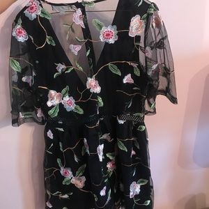 Honey punch short floral/sheer romper. Worn once